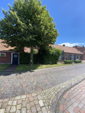Modernisiertes und hell eingerichtetes Ferienhaus mit eigenem Garten ideal für Familien